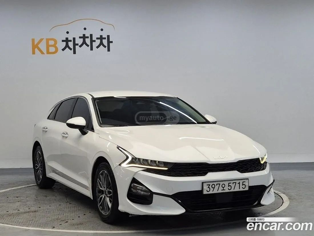 Kia Optima - фото 4
