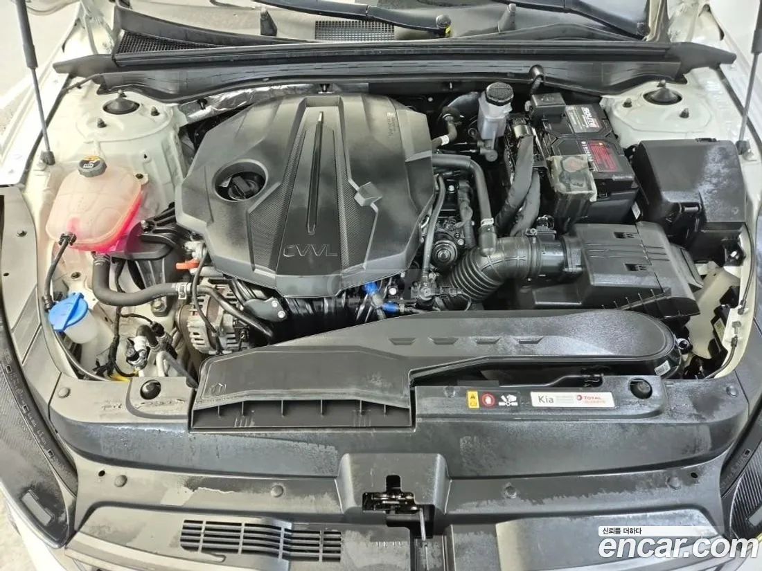 Kia Optima - фото 5