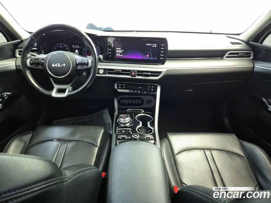 Kia Optima - фото 7