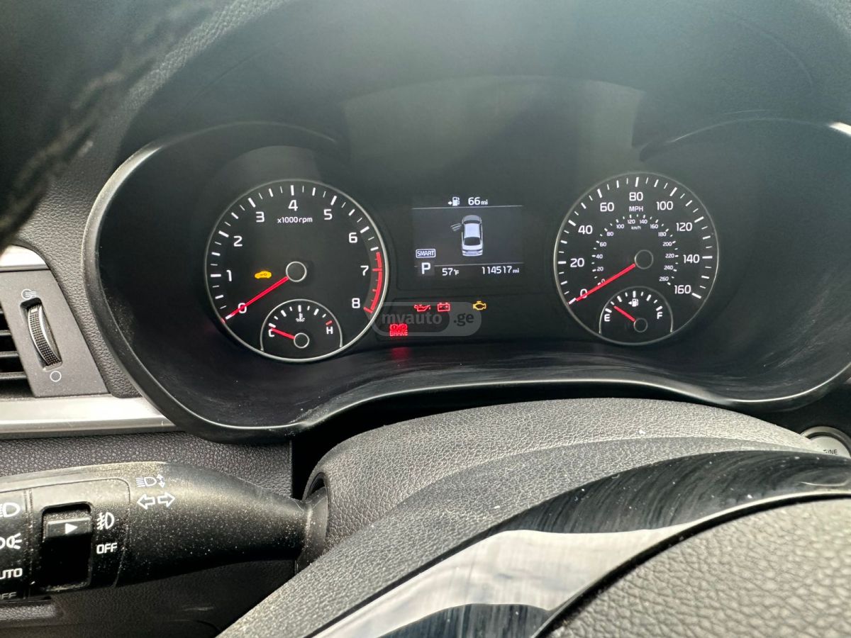 Kia Optima - фото 4