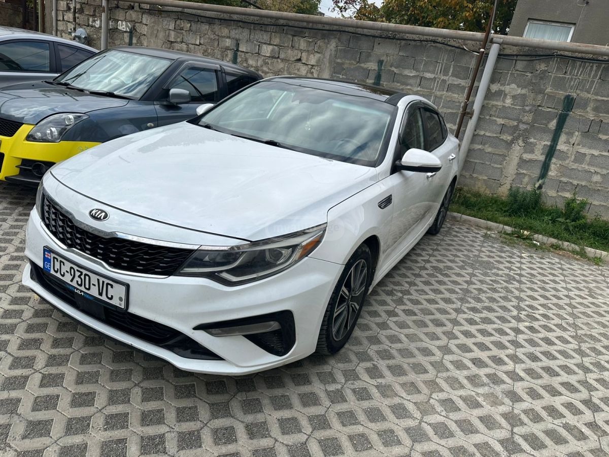 Kia Optima - фото 5
