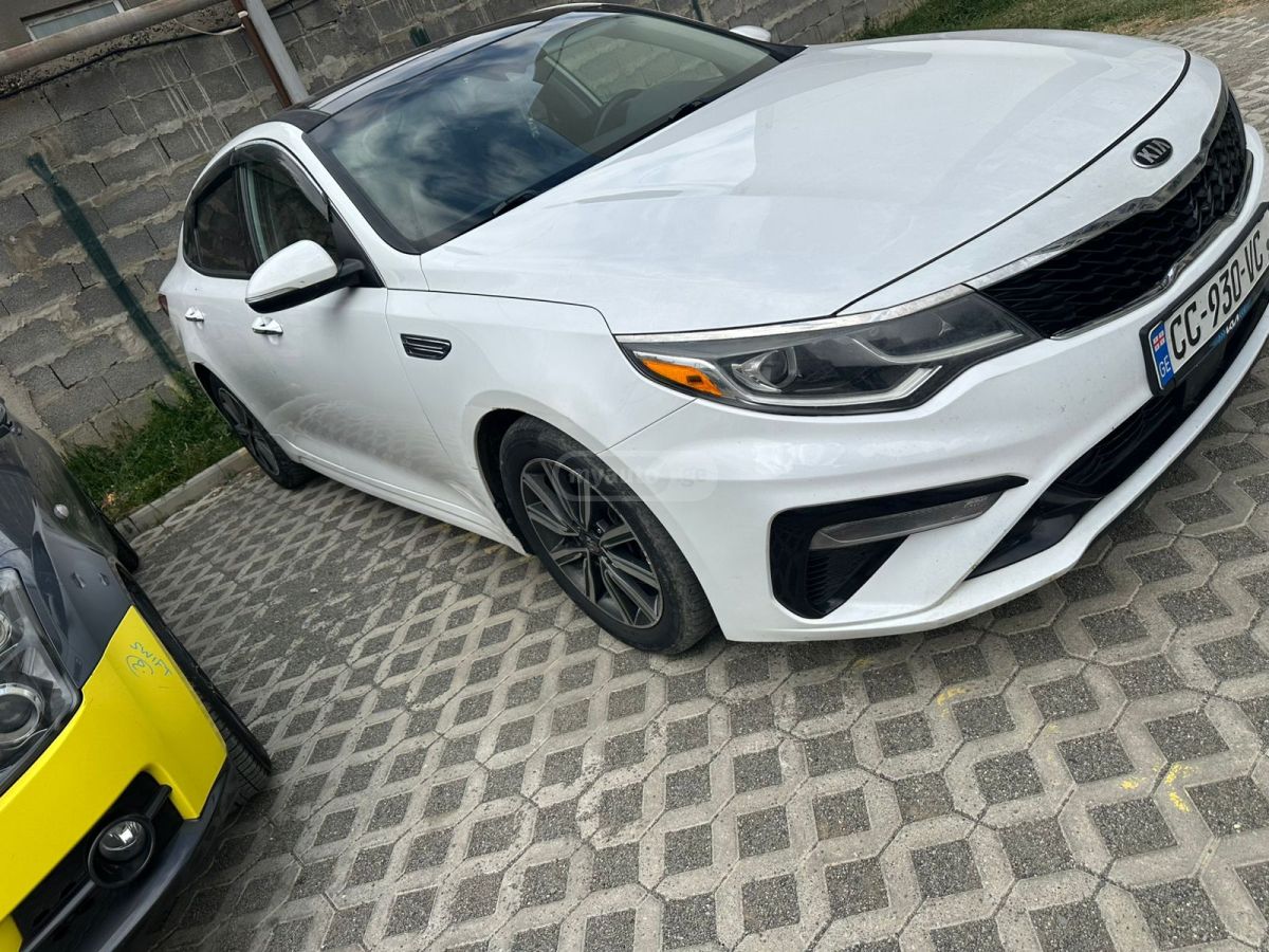 Kia Optima - фото 7