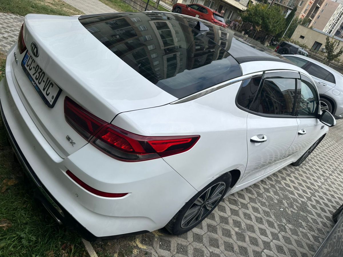 Kia Optima - фото 8