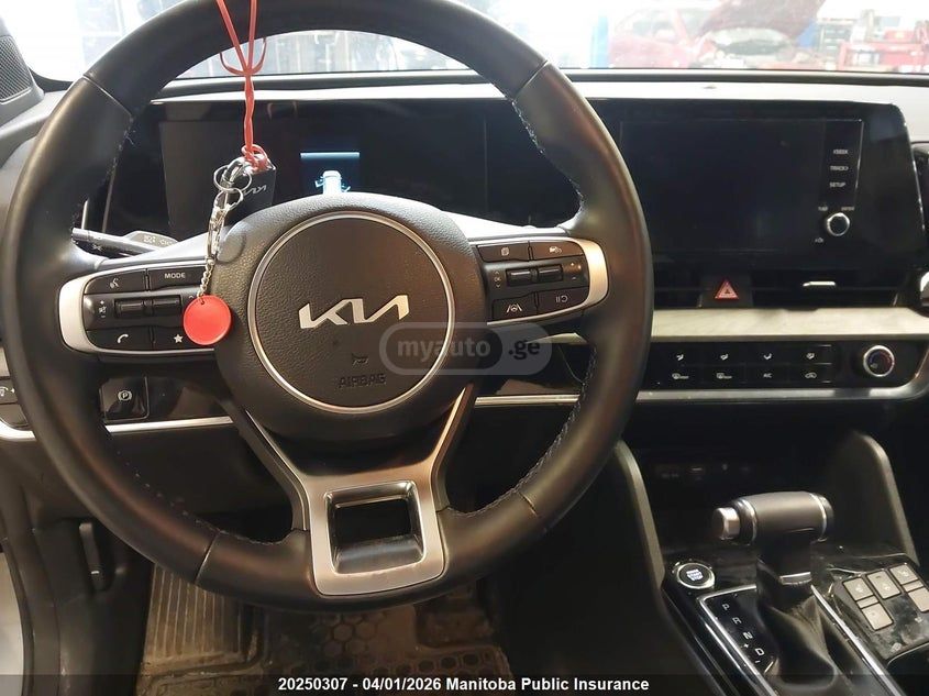 Kia Sportage - фото 7