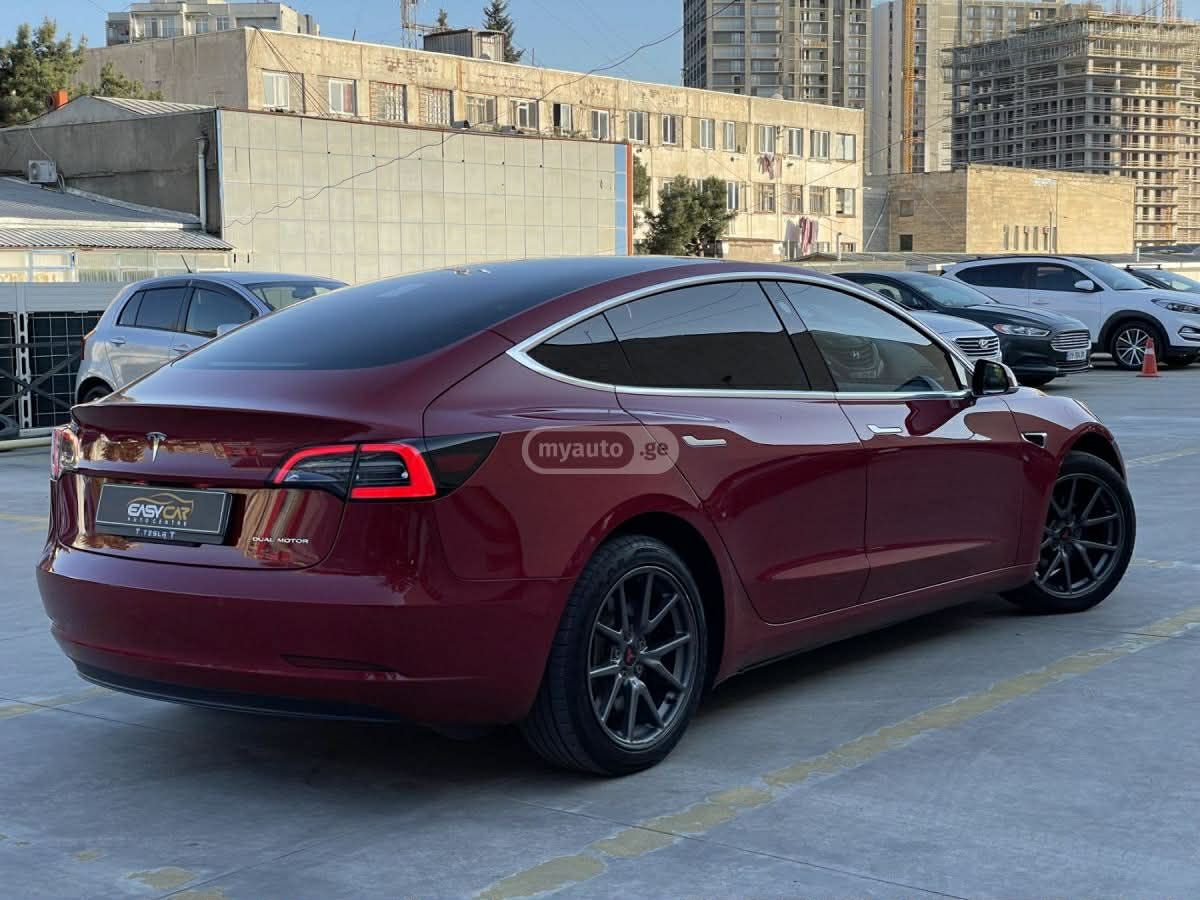 Tesla Model 3 - фото 8