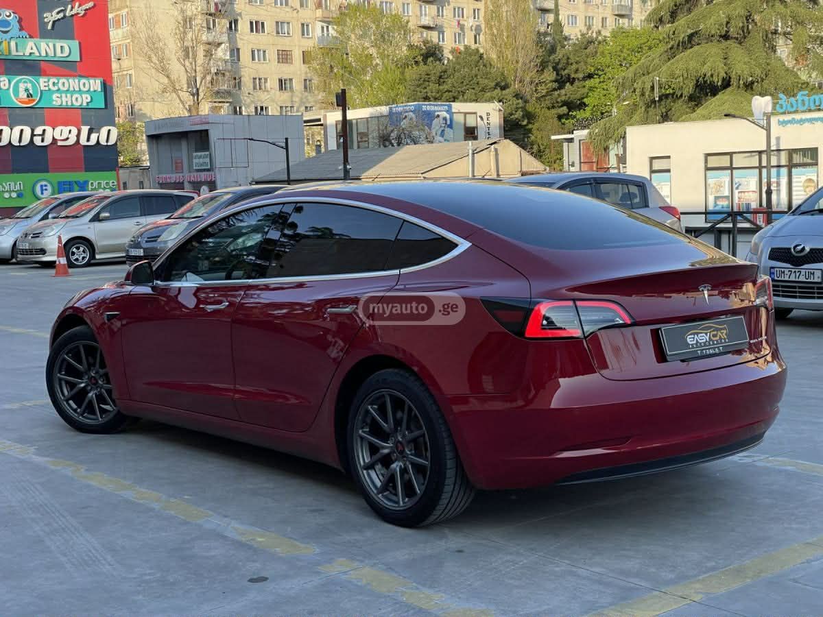 Tesla Model 3 - фото 9