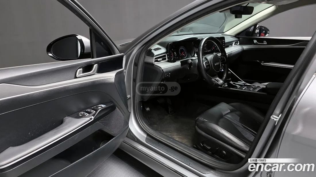 Kia Optima - фото 10