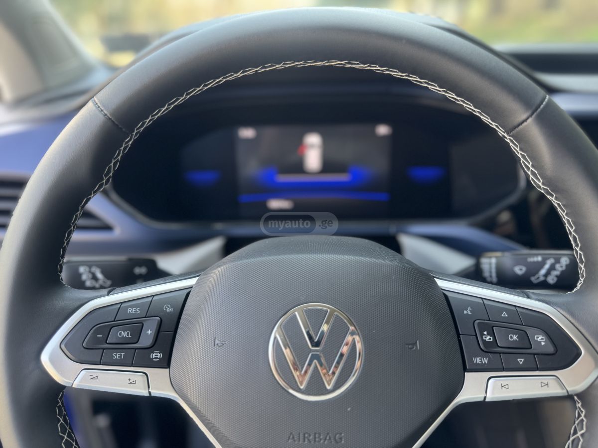 Volkswagen Taos - фото 9