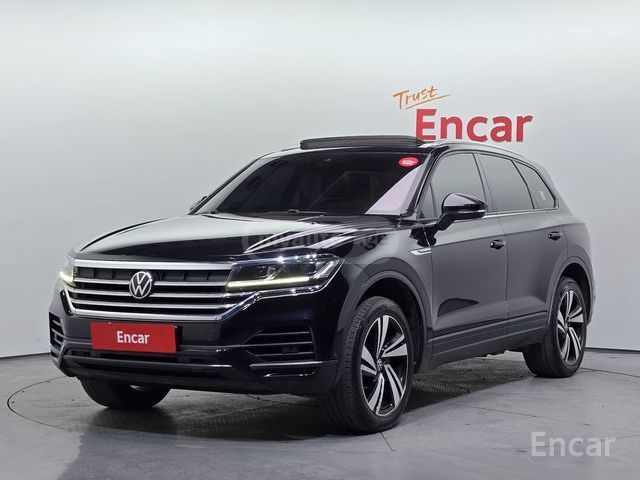 Volkswagen Touareg - фото 1