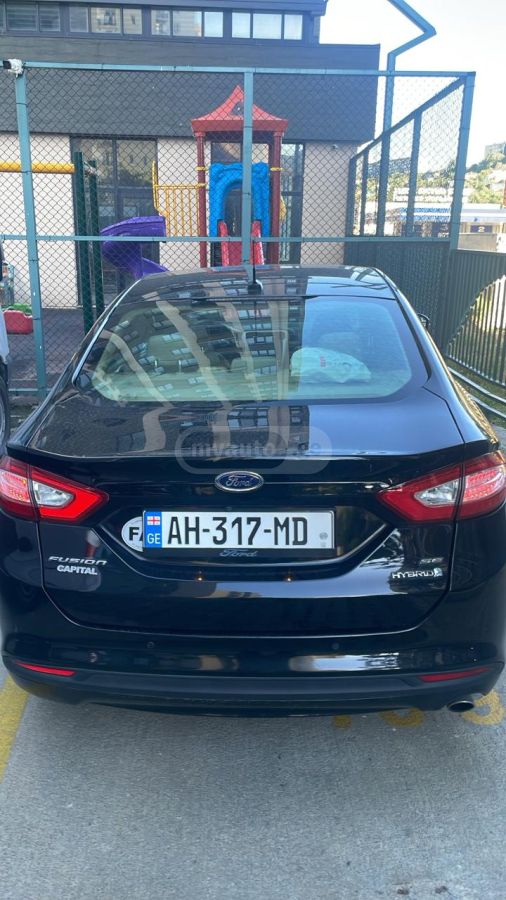 Ford Fusion - фото 8