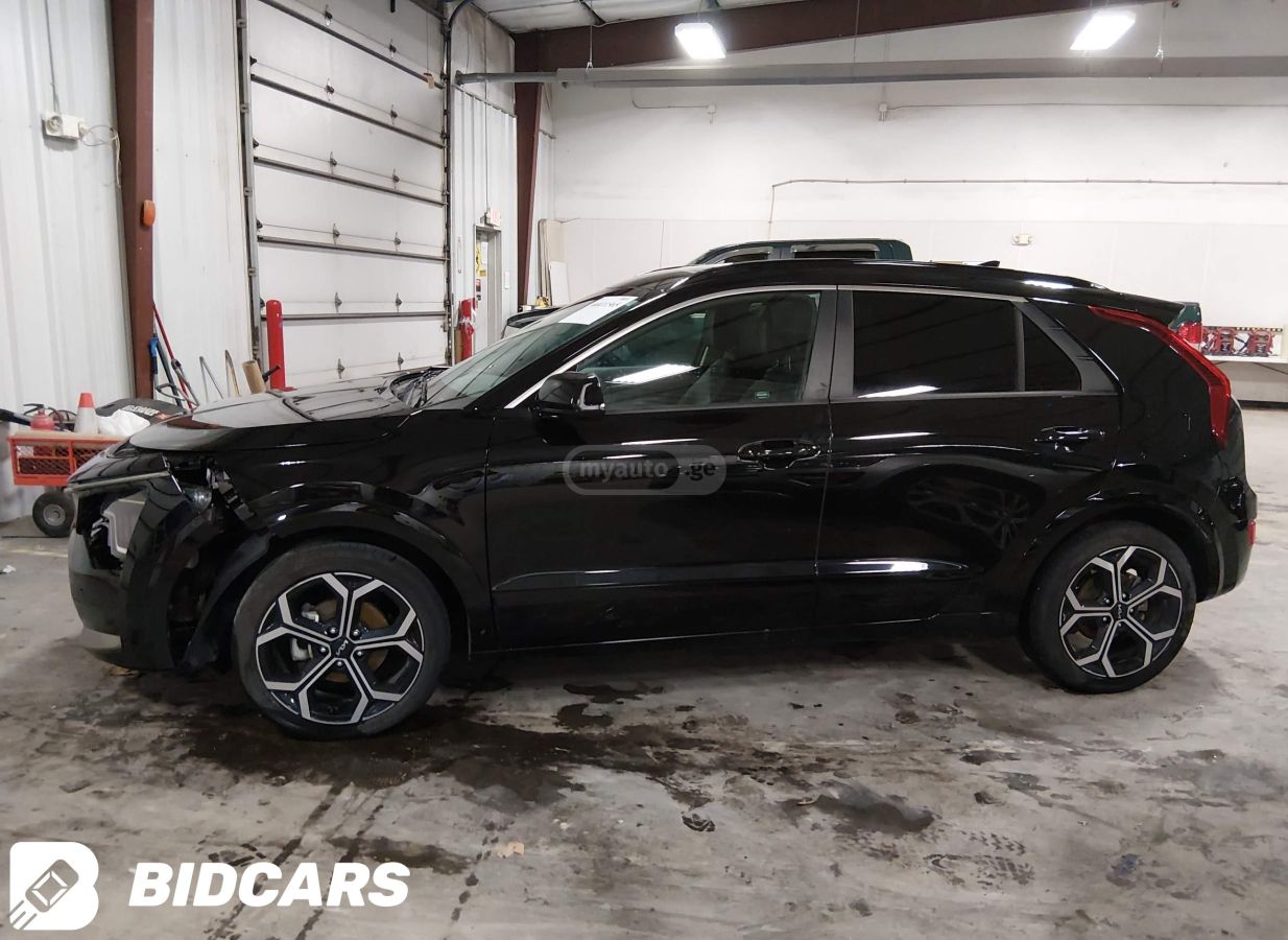 Kia Touring — миниатюра 1