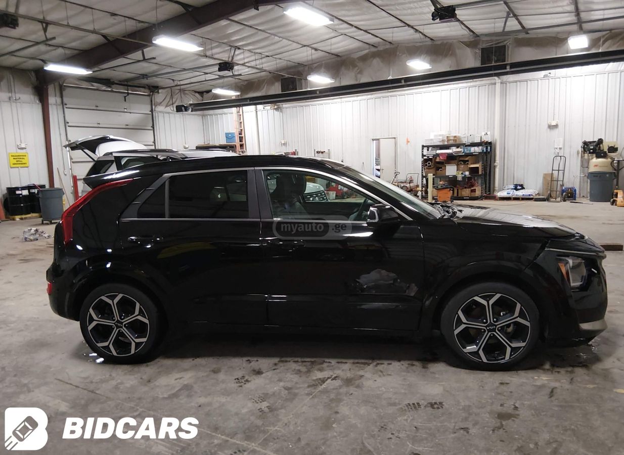 Kia Touring — миниатюра 4