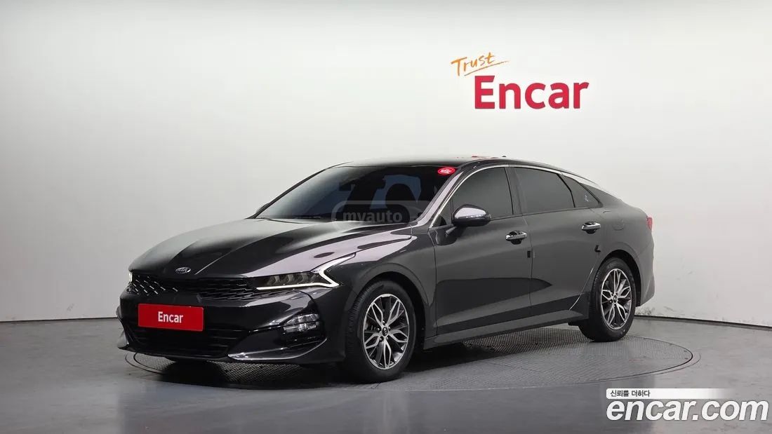 Kia Optima - фото 1