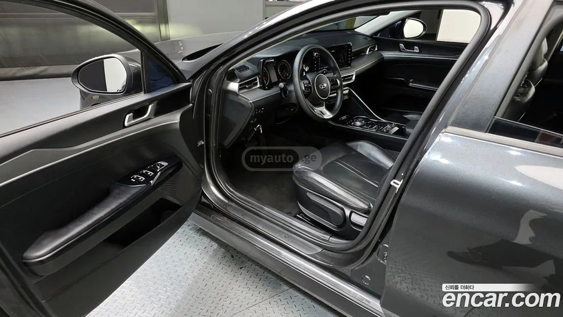 Kia Optima - фото 10