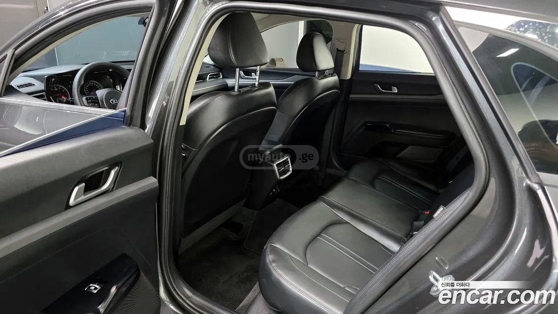 Kia Optima - фото 11