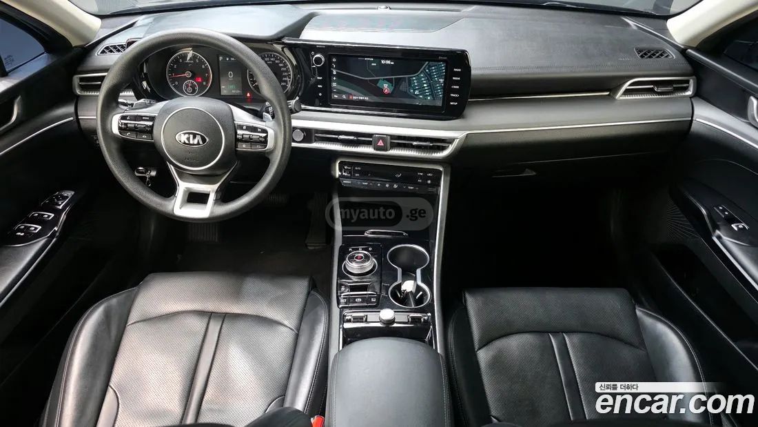 Kia Optima - фото 7