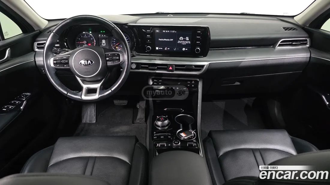 Kia Optima - фото 7