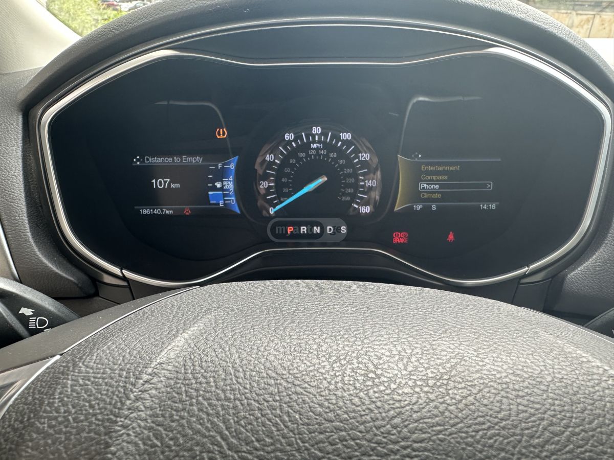 Ford Fusion - фото 12