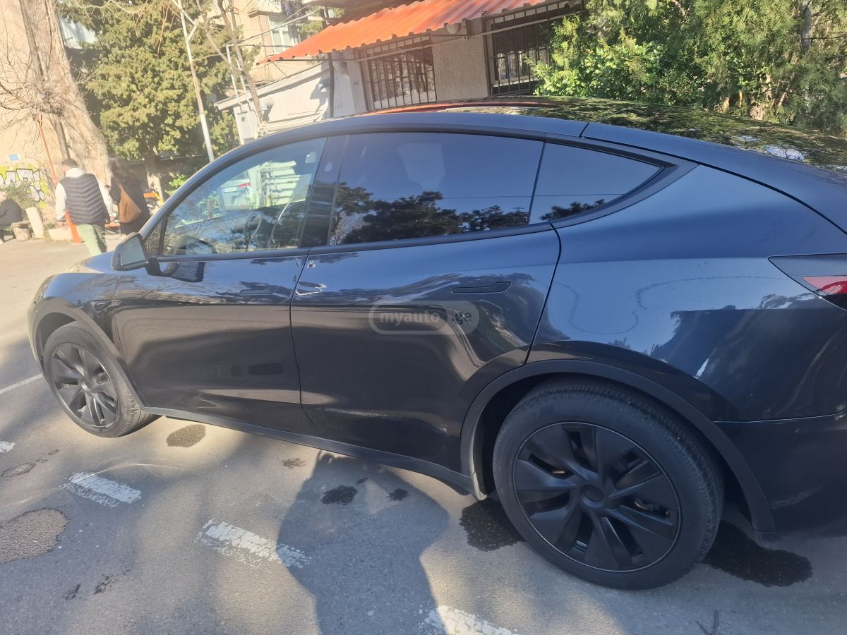 Tesla Model Y 2025 — фото 4 купить в Москве