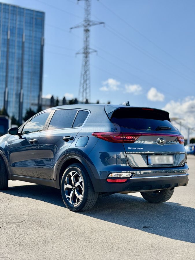 Kia Sportage - фото 1