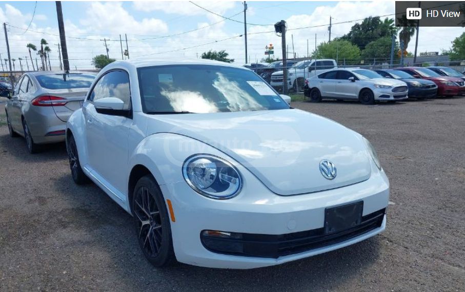 Volkswagen New Beetle - фото 1