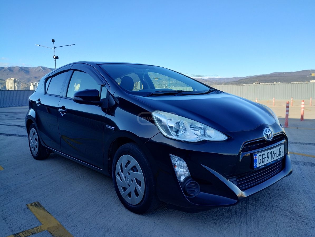 Toyota Aqua - фото 8