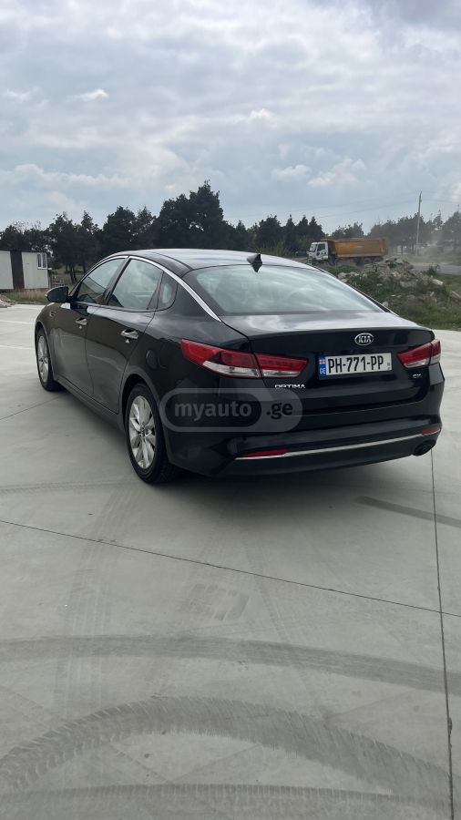 Kia Optima - фото 4