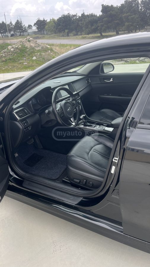 Kia Optima - фото 7
