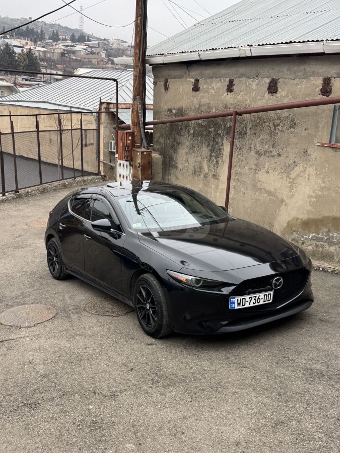 Mazda Mazda 3 - фото 1