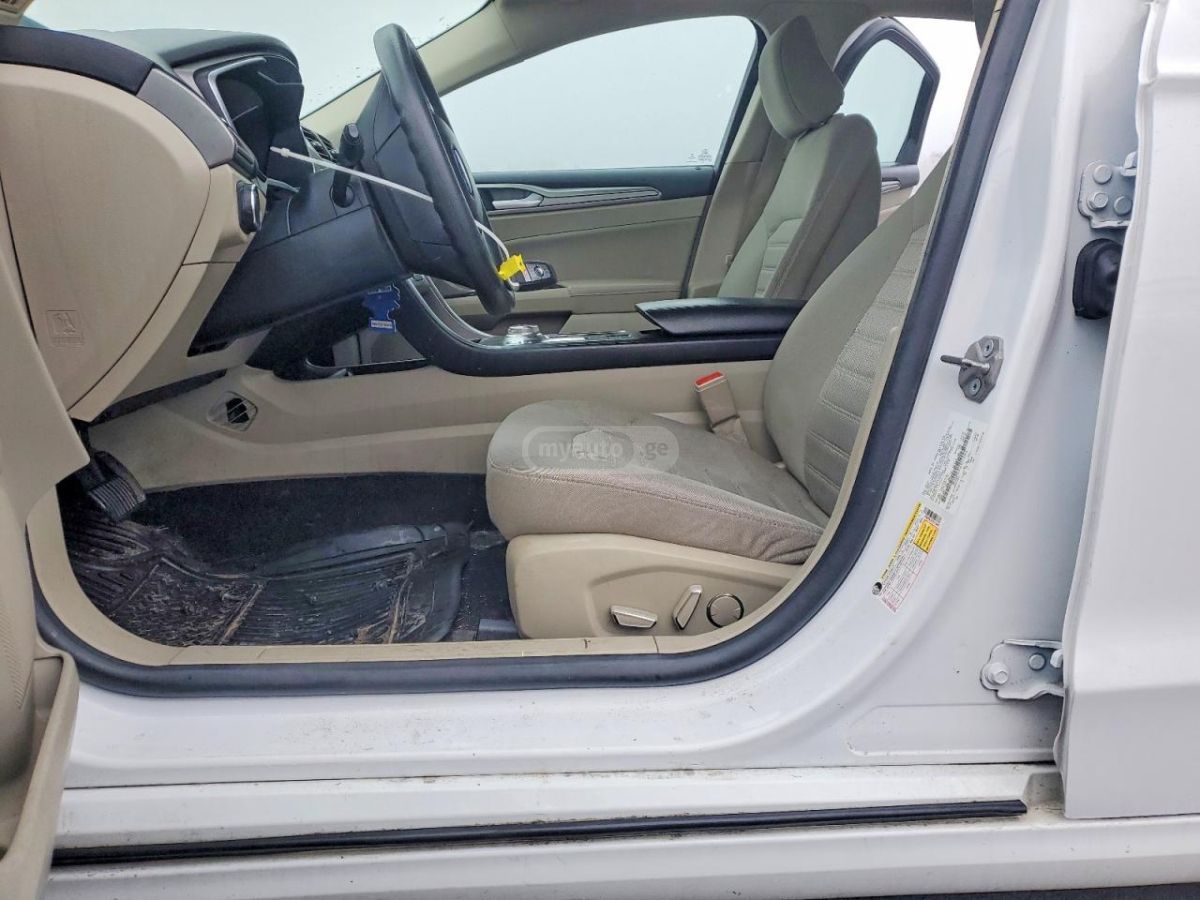 Ford Fusion - фото 7