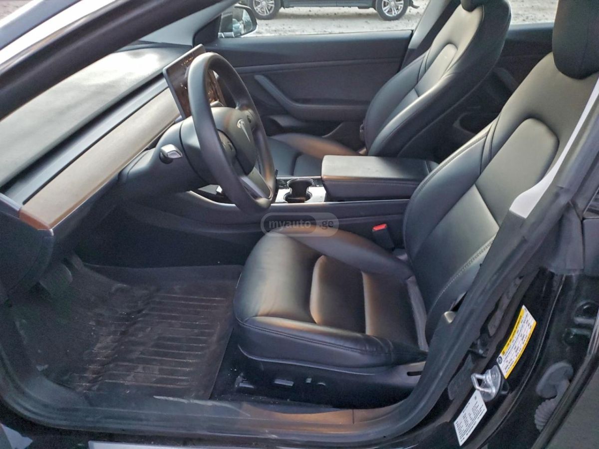 Tesla Model 3 - фото 7