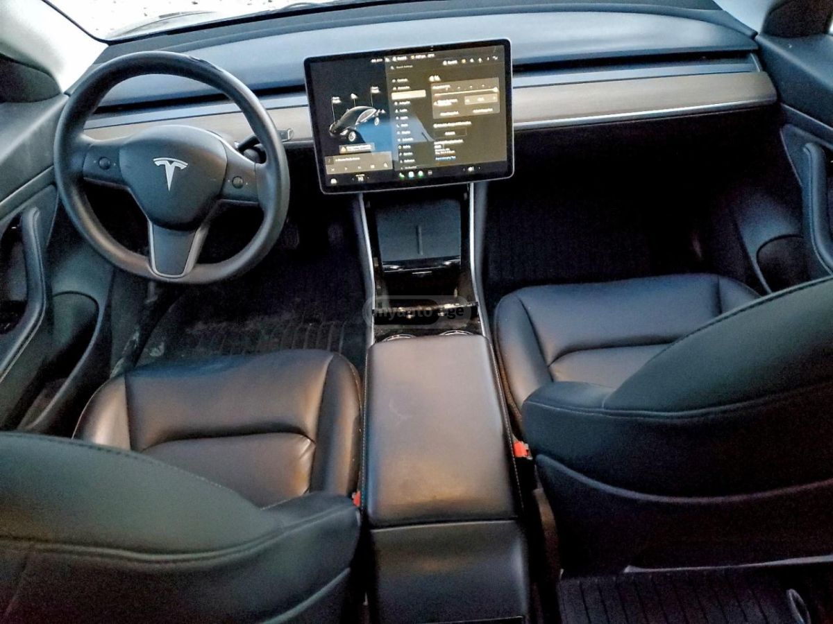 Tesla Model 3 - фото 8