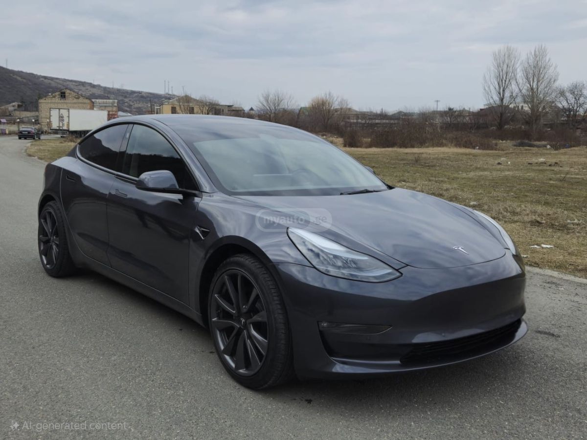 Tesla Model 3 - фото 1