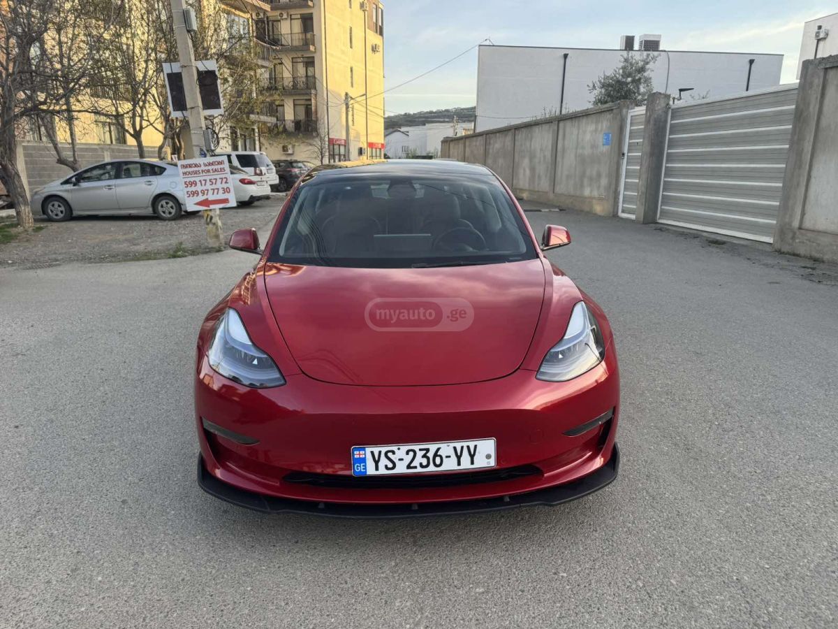 Tesla Model 3 - фото 1