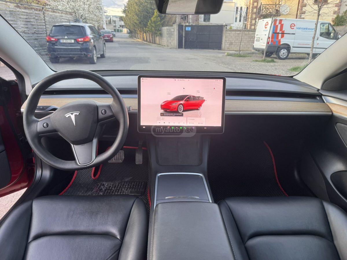 Tesla Model 3 - фото 10