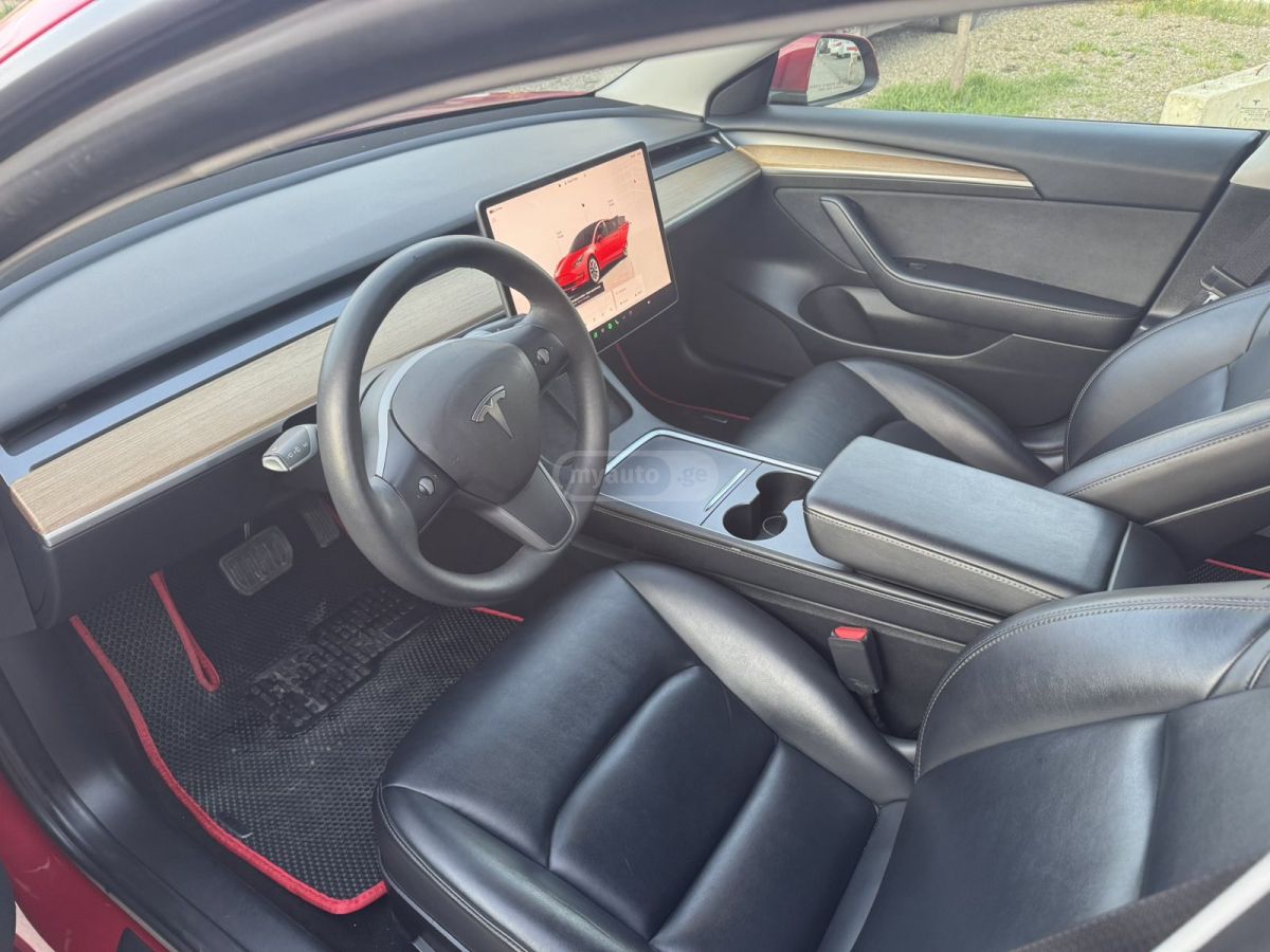 Tesla Model 3 - фото 11