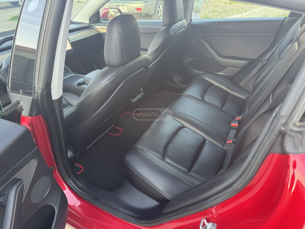 Tesla Model 3 - фото 12