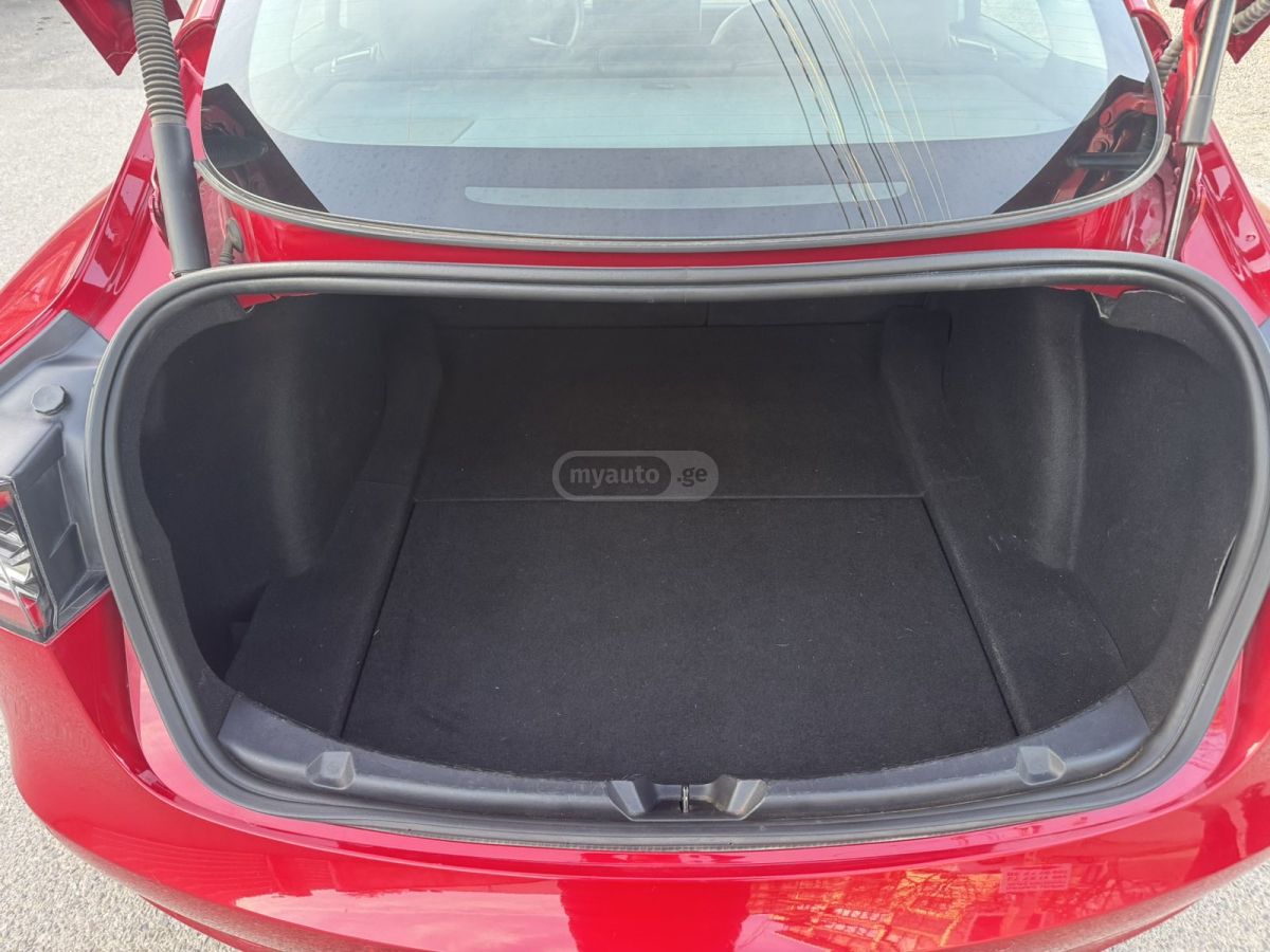 Tesla Model 3 - фото 13