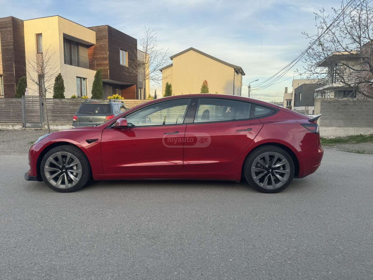 Tesla Model 3 - фото 9