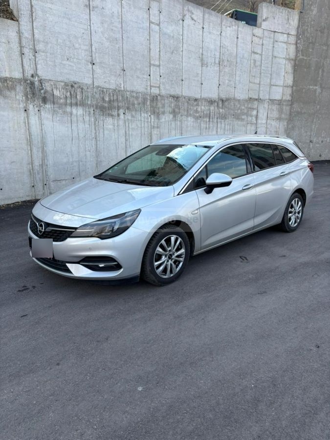 Opel Astra - фото 1