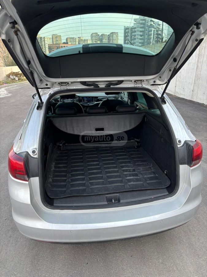 Opel Astra - фото 11