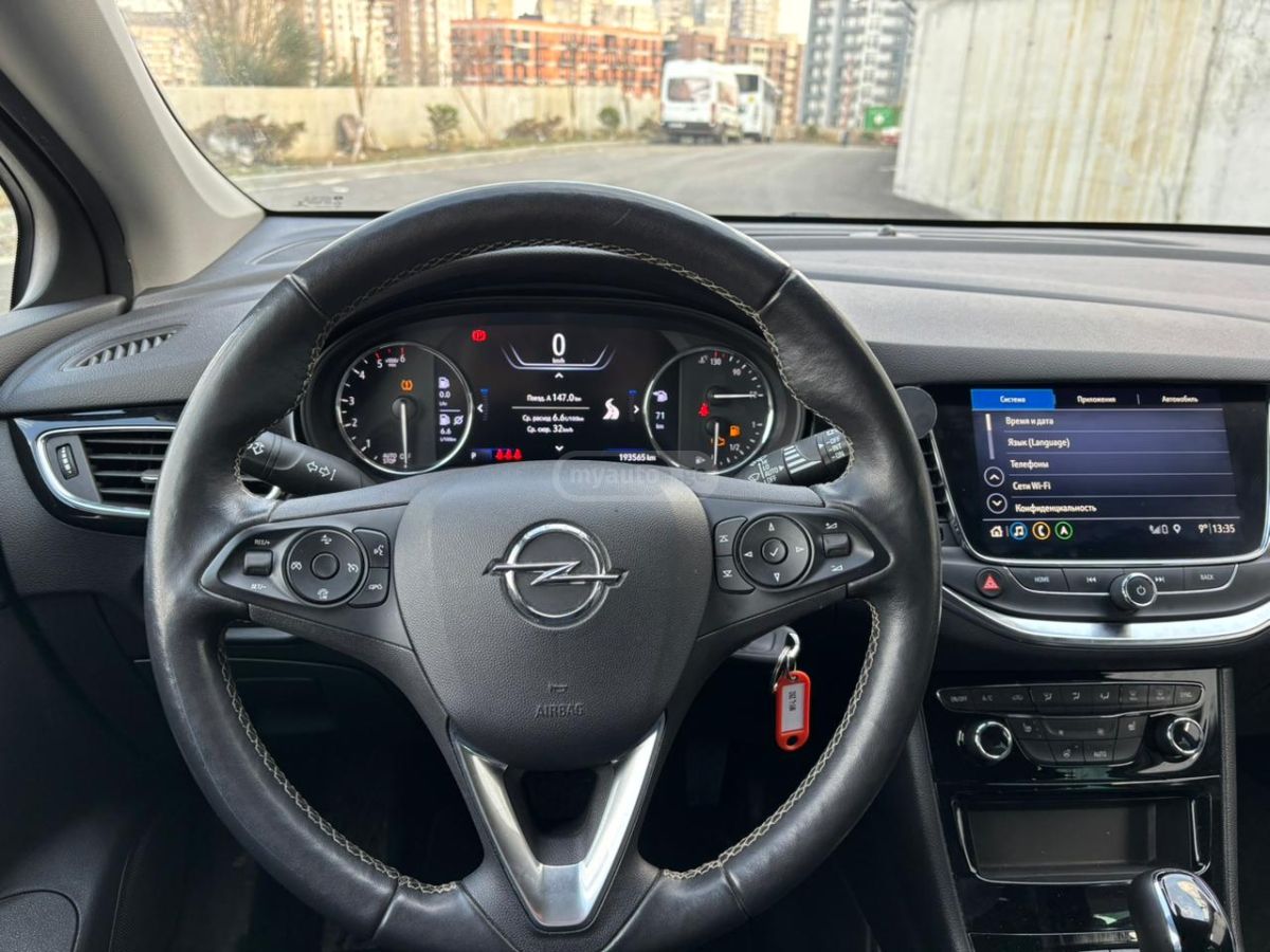 Opel Astra - фото 13