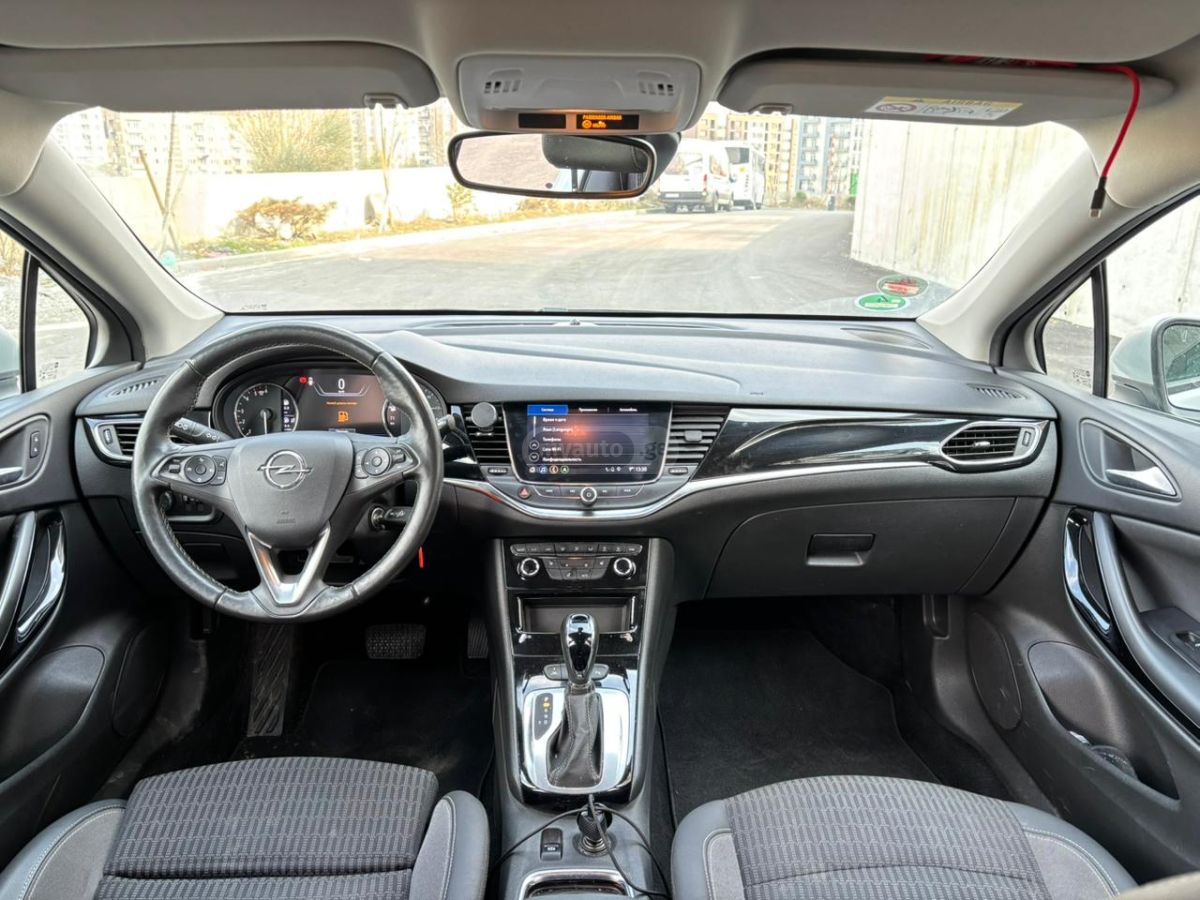 Opel Astra - фото 8