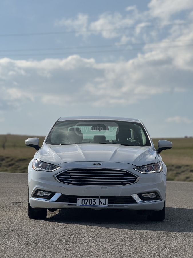 Ford Fusion - фото 12