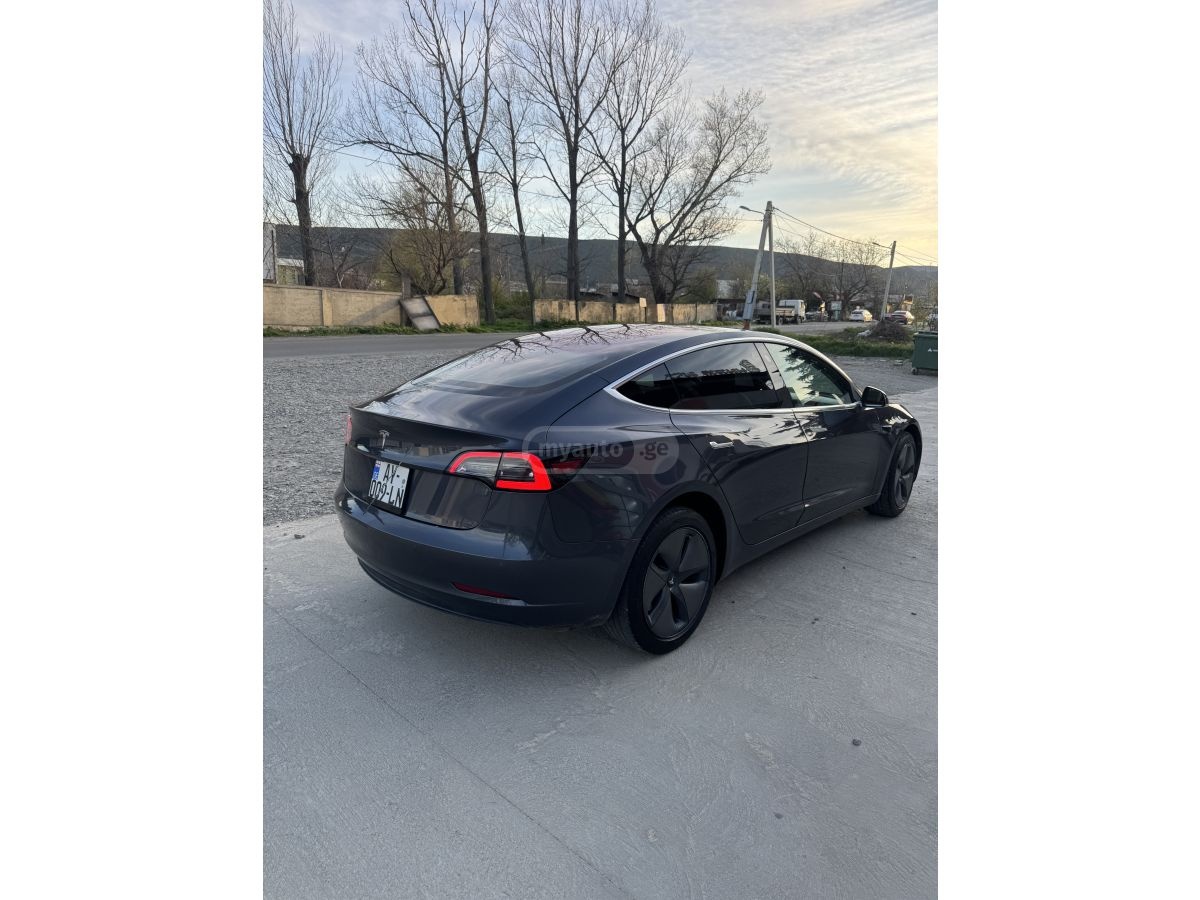 Tesla Model 3 - фото 6