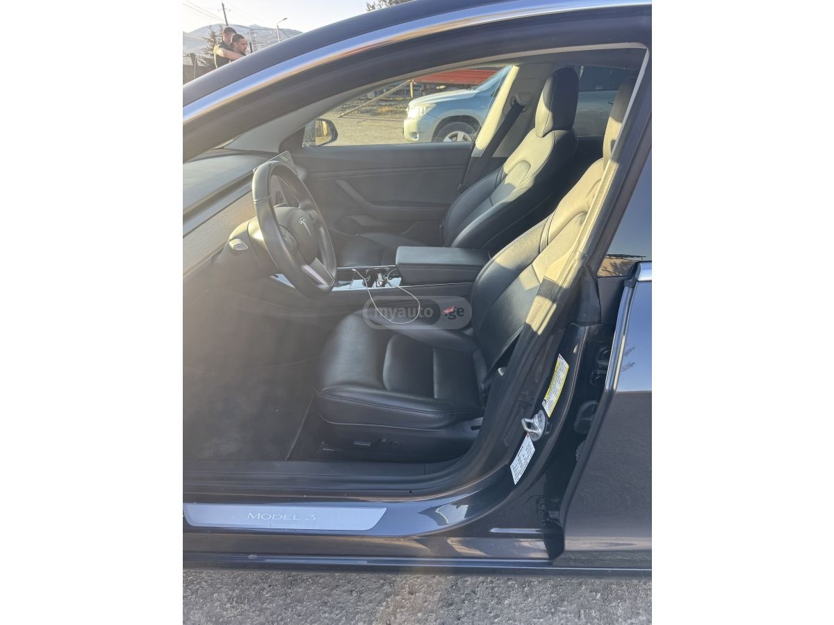 Tesla Model 3 - фото 7