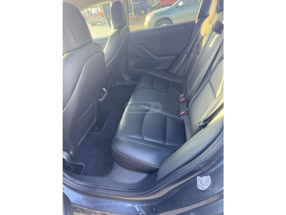 Tesla Model 3 - фото 8