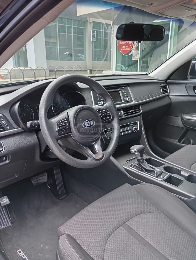 Kia Optima - фото 3