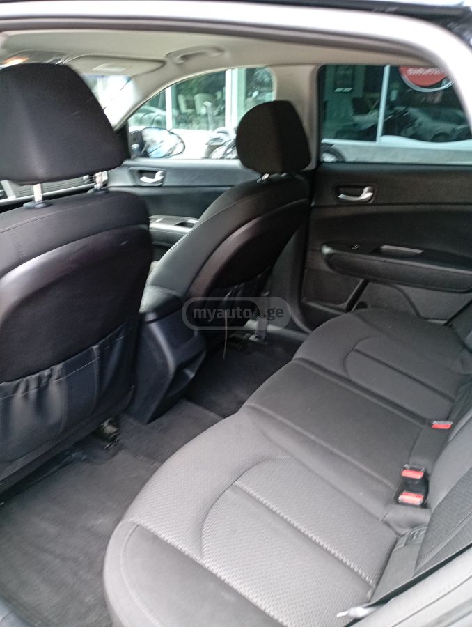 Kia Optima - фото 5