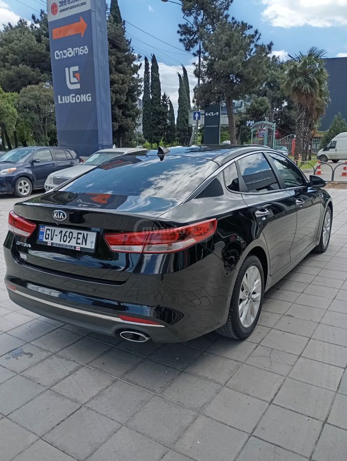 Kia Optima - фото 7